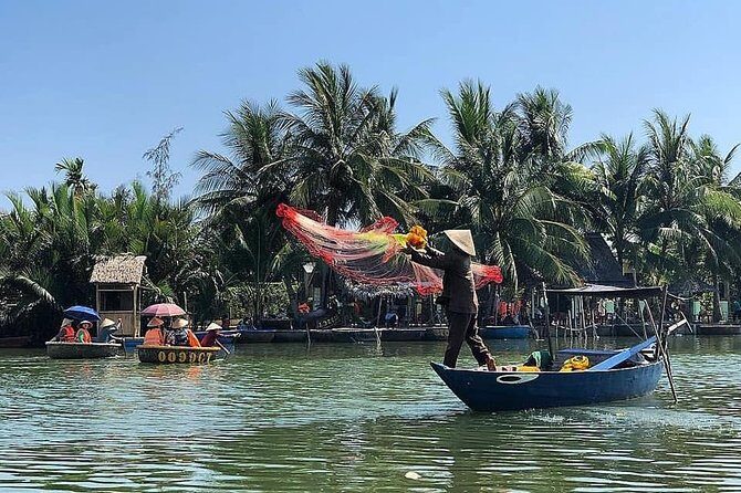 Basket Boat Riding at Bay May coconut village - On the Water: Small Circular Boats, Coconut Canopy, and Guide Interaction