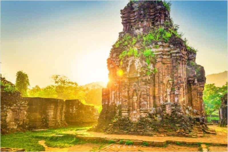 From Hoi An: Half-Day My Son Sanctuary & Sunset Cruise - My Son Sanctuary: seeing Hindu-era brick towers in a jungle valley