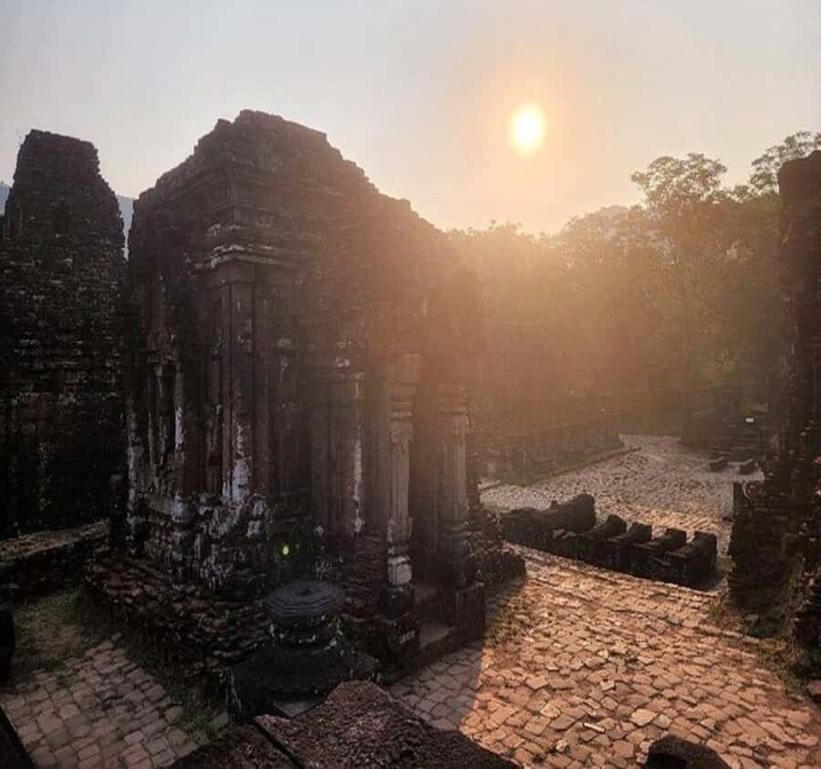 Hoi An: Half-Day to My Son Sanctuary & Sunset River Cruise - What your guide points out at the brick towers (and why it matters)