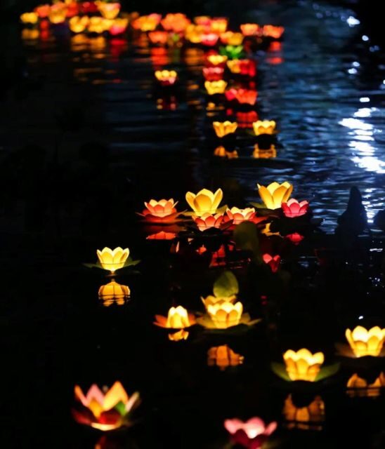 Hoi An : Hoai River Boat Trip by Night and Floating Lantern - The lantern ritual: lighting and release during the ride