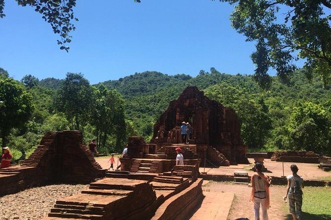 My Son Sunset Trip with Banh Mi and Cruise from Hoi An/ Da Nang - Pickup from Hoi An center and the golf cart shortcut